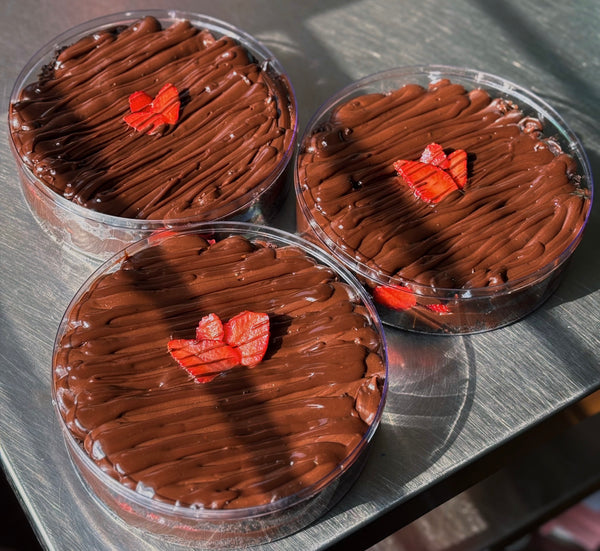 Matilda dessert with fresh strawberry puddle in a jar